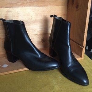 Black leather pull-on ankle boots